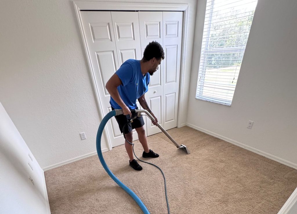 Carpet Cleaning Technician steam cleaning a clearwater home carpet